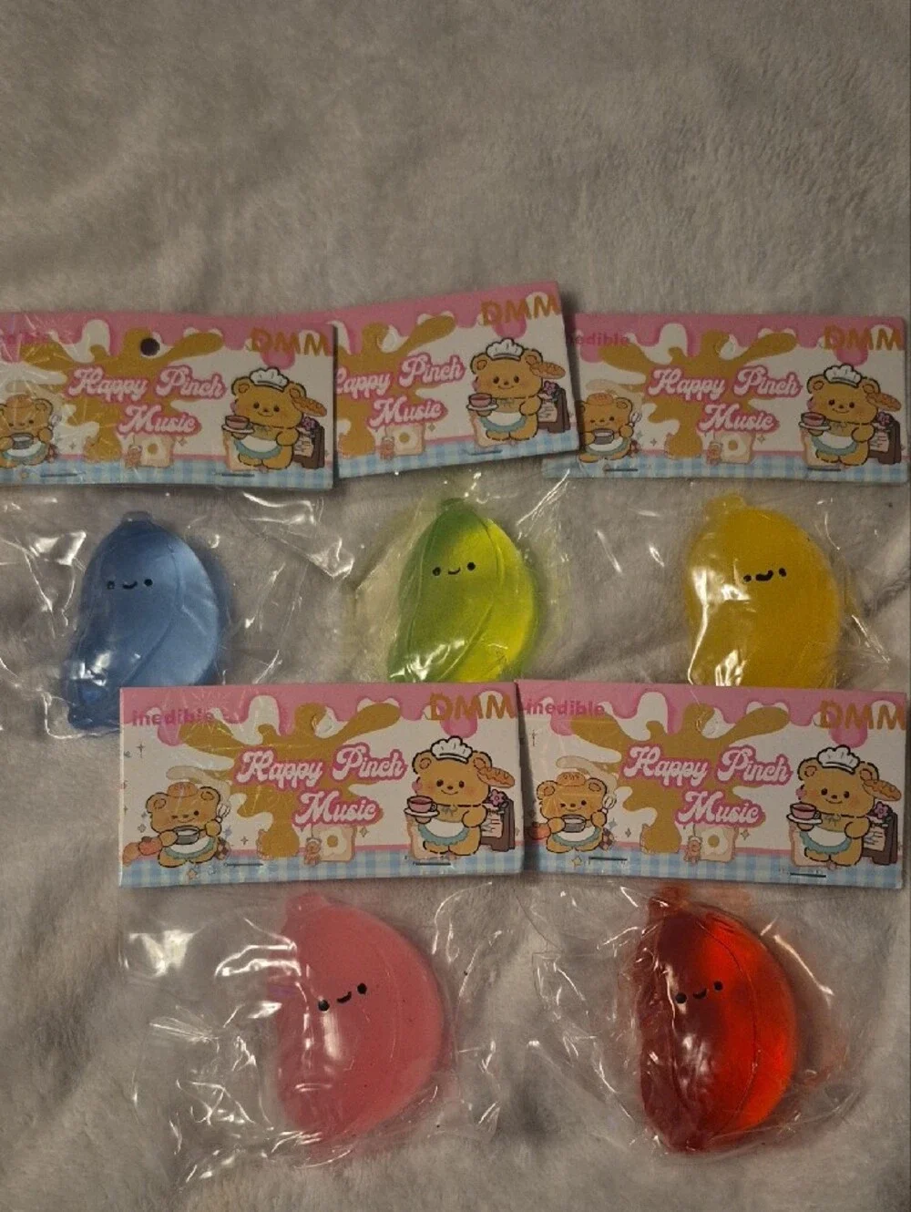 Happy Pinch Music Squeeze Toy Pack — Blue, Green, Yellow, Pink, Red